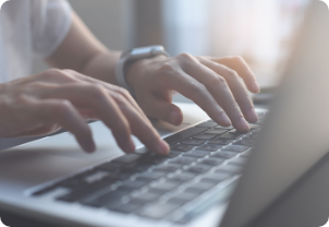 Person typing on laptop